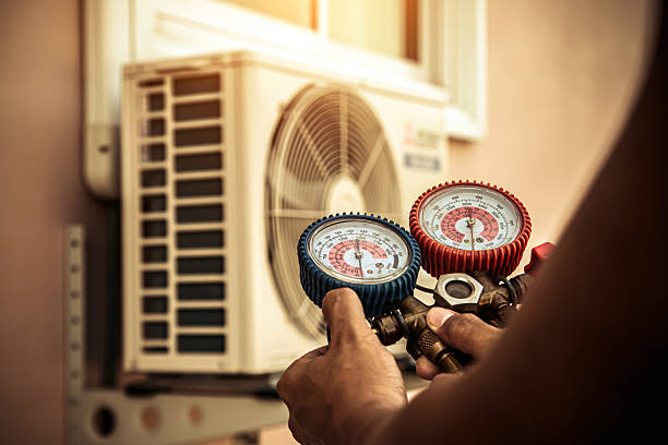 Professional Heat Pump Repair technician working in El Granada, CA